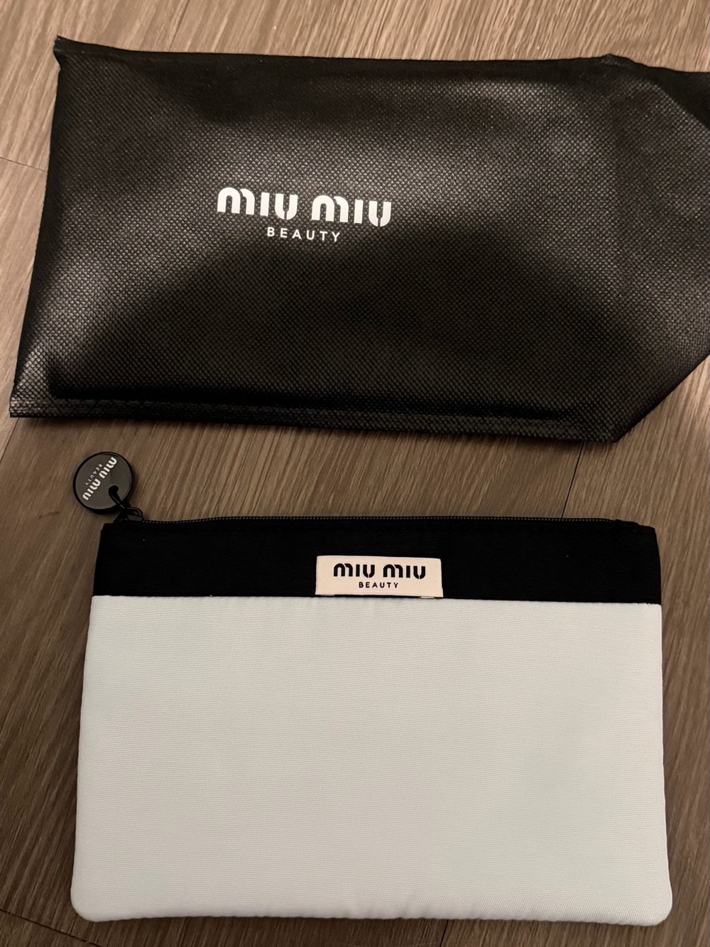 Miu Miu Cosmetic Pouch in baby blue